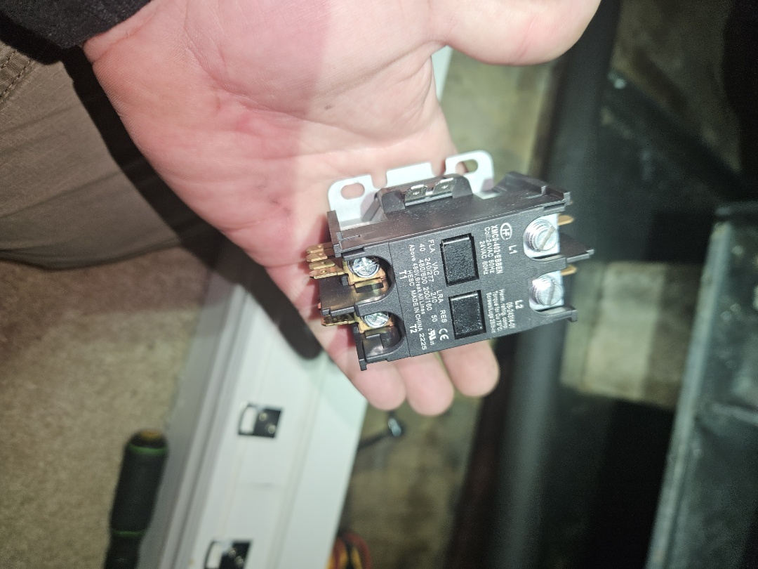 Goodman split heat pump, whole house system.  2 floors, one thermostat. 

at arrival, thermostat was blank. low voltage fuse was blown inside of air handler.  traced issue down to a shorted contactor for the auxiliary heat strips. contactor relay was melted. 

replaced the contactor and tested the heat. system is now working properly. 

recommend our HVAC Protection Pledge to clean and maintain the system twice a year for best performance and to keep any warranty valid