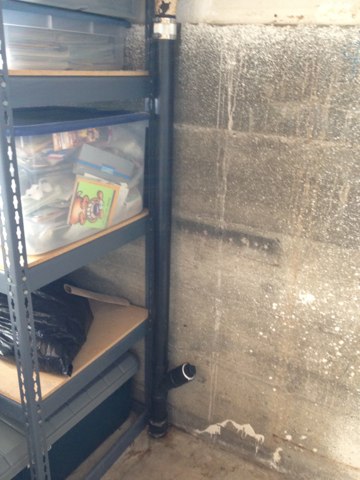 Replace leaky drain pipe in garage