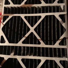 Maintenance and a/c check on carrier air conditioner with air filter replacement. 