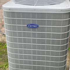 Maintenance and a/c check on carrier air conditioner with air filter replacement. 