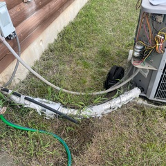 Maintenance on a Carrier ac system. Removed old insulation wrap on copper pipes and rewrapped pipes with new insulation and with uv resistant tape. 