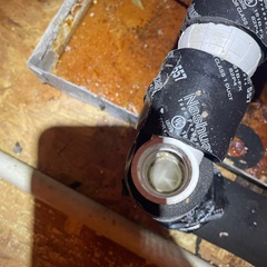 Diagnostic on an a/c that is leaking water. The secondary drain pan was extremely rusted, water was escaping and leaking pan. The drain line was clogged and not allowing water to drain from it. 