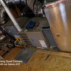 Maintenance on a Carrier gas furnace system. Replace air filter and cleared drain line. 