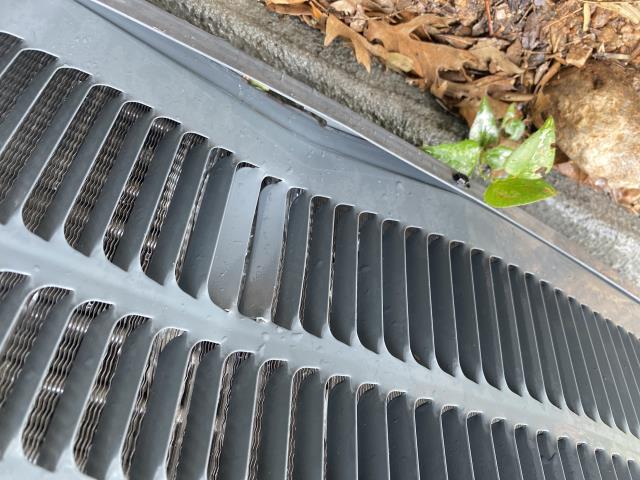 Annual Inspection on a Goodman Heat Pump Air Conditioning system. lawn mower had thrown a rock against the condensing unit. Fortunately the damage was only superficial 