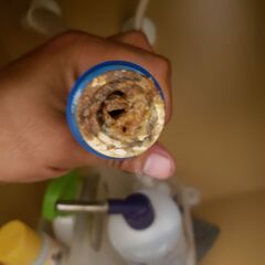 Air conditioning system is not cooling. Repair to a/c drain line. Found that the primary drain line was clogged. Removed water out of the secondary drain pan and cleared out the primary drain line from under the bathroom sink. 