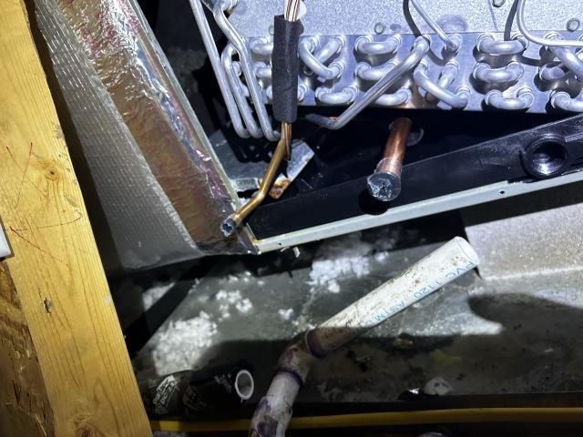 Condensation on AC coils and duct. Air conditioner not cooling. Water pooling needs draining. Ductwork problem. Refrigerant low. Air conditioner service performed. 