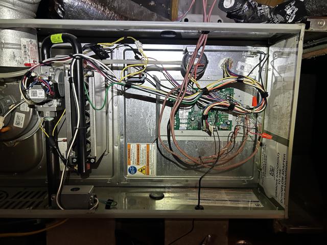 Condensation on AC coils and duct. Air conditioner not cooling. Water pooling needs draining. Ductwork problem. Refrigerant low. Air conditioner service performed. 