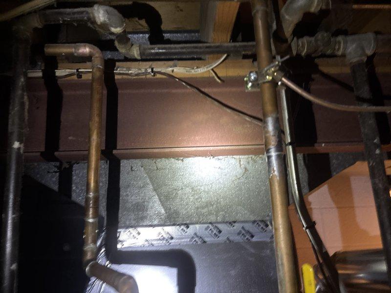 Performed scheduled water heater flush service as requested. Inspected copper plumbing infrastructure and associated HVAC ductwork in utility area. Completed maintenance procedure to remove sediment buildup and restore optimal water heater performance.