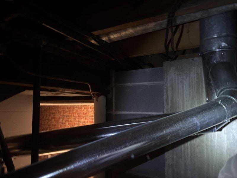 Performed scheduled water heater flush service as requested. Inspected copper plumbing infrastructure and associated HVAC ductwork in utility area. Completed maintenance procedure to remove sediment buildup and restore optimal water heater performance.