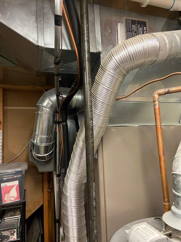 Conducted follow-up assessment for potential tankless water heater installation. Evaluated existing mechanical room containing current tank-style water heater, HVAC system with flexible ductwork, and associated copper/PVC plumbing. Documented current setup and space constraints to provide homeowner with appropriate recommendations for dual tankless water heater conversion.