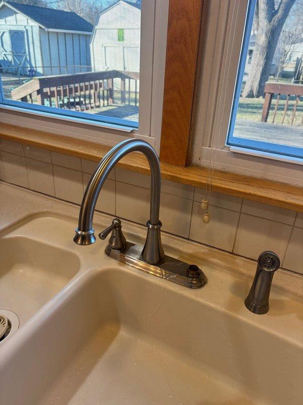 Responded to service call for kitchen faucet hot water leak and bathroom sink shut-off valve leak. Diagnosed and replaced faulty valve stem component that was showing significant wear and discoloration. Successfully restored proper function to both the kitchen faucet system and bathroom plumbing fixture, eliminating all leaks.