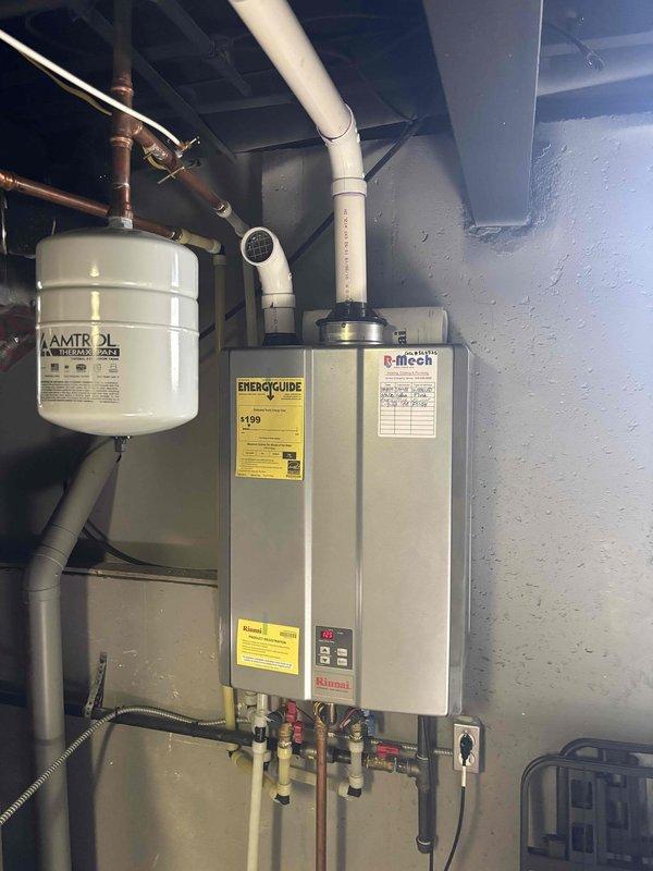 Performed diagnostic verification on Rinnai tankless water heater system with no water issue. Inspected internal wiring connections and plumbing components including expansion tank and supply lines. Documented system configuration with photos to facilitate proper parts ordering for the follow-up repair.