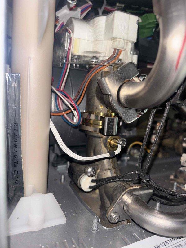 Performed diagnostic verification on Rinnai tankless water heater system with no water issue. Inspected internal wiring connections and plumbing components including expansion tank and supply lines. Documented system configuration with photos to facilitate proper parts ordering for the follow-up repair.