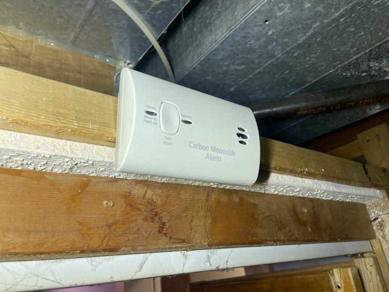 Performed service on tanked water heater in basement. Removed safety tag, verified proper operation, and relit the unit. Conducted gas leak test using bubble solution with no leaks detected. Confirmed carbon monoxide alarm was properly installed and functioning.