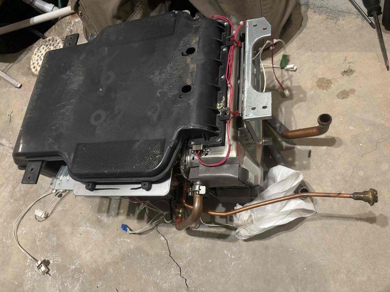 Completed burner pull and clean service on heating system installed approximately 2014/2015 that was producing horn-like noise when engaged. Removed heavily contaminated filter assembly with significant dirt/debris buildup and thoroughly cleaned burner components to restore proper operation and eliminate noise issue. System now functioning as designed with improved airflow and combustion efficiency.