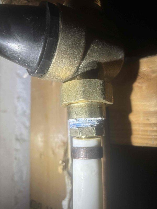 Installed 3/4" Pressure Reducing Valve (PRV) to address dangerously high water pressure measured at 180psi, significantly exceeding code requirements of 60-80psi. This installation will prevent water hammer issues and extend the lifespan and functionality of household plumbing fixtures by maintaining appropriate pressure levels.