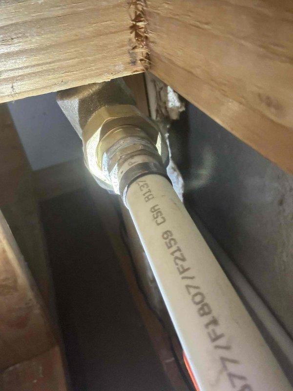 Installed 3/4" Pressure Reducing Valve (PRV) to address dangerously high water pressure measured at 180psi, significantly exceeding code requirements of 60-80psi. This installation will prevent water hammer issues and extend the lifespan and functionality of household plumbing fixtures by maintaining appropriate pressure levels.