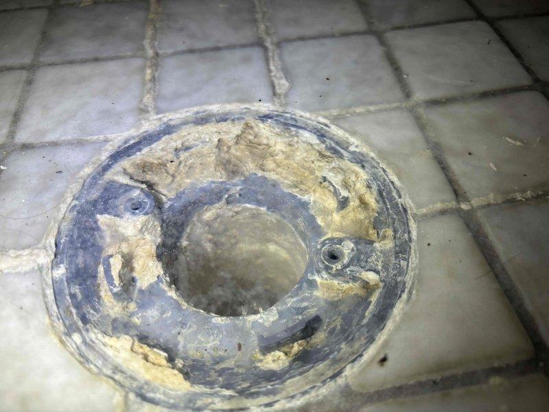 Cleared heavily clogged shower drain with significant debris buildup and descaled bathroom sink aerator to restore proper water pressure. Verified both fixtures now functioning correctly with normal drainage and flow.