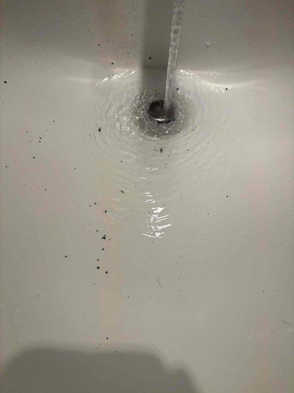 Responded to follow-up service call regarding reported water heater leak. Diagnostic inspection revealed water dripping from pressure relief valve. Pressure gauge testing showed system operating at approximately 80-100 PSI, exceeding recommended parameters. Installed pressure regulator to normalize system pressure and prevent further relief valve discharge.