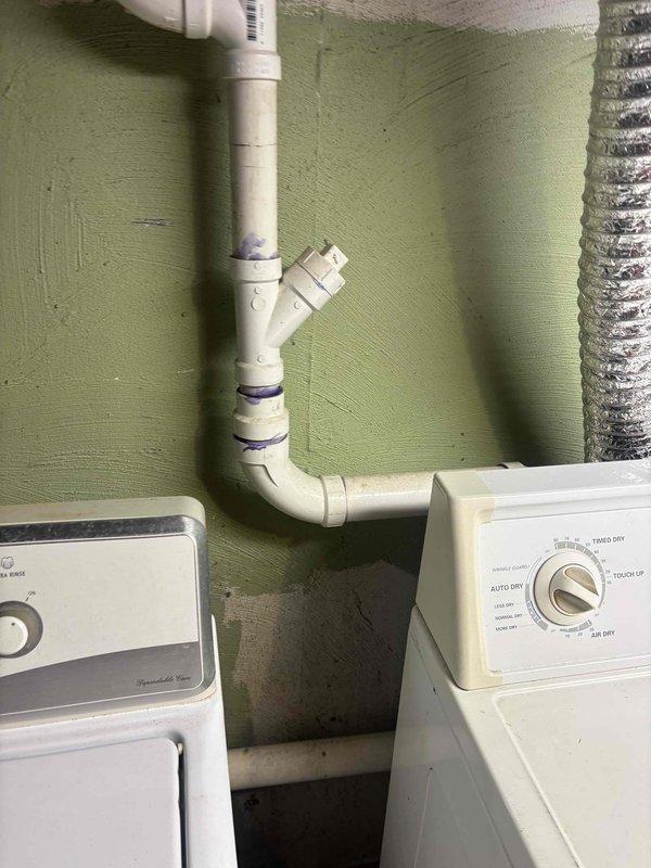 Responded to service call for a kitchen sink clog. Inspected the P-trap and drainage system, which required accessing basement plumbing. Cleared obstruction in the PVC drain line where it connects to the main waste stack. Successfully restored proper drainage function and verified system operation before completion.