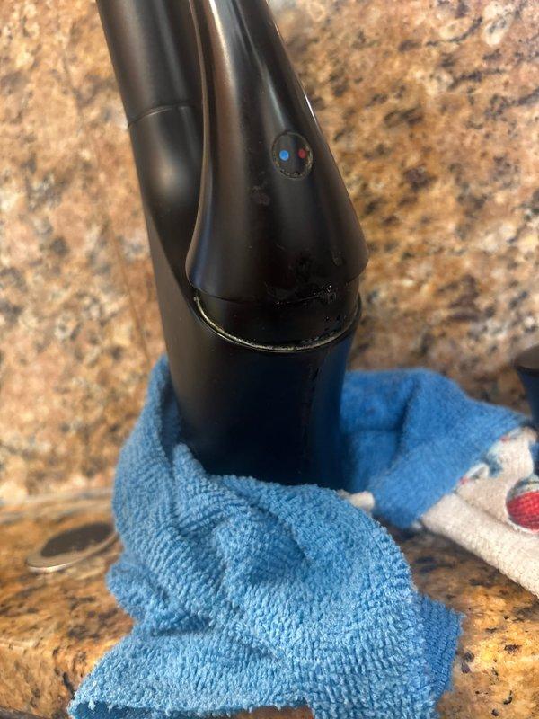 Responded to service call for leaking kitchen sink in 80-year-old residence. Performed water shutoff and replaced worn washer in faucet assembly. Successfully restored proper function, eliminating leak.