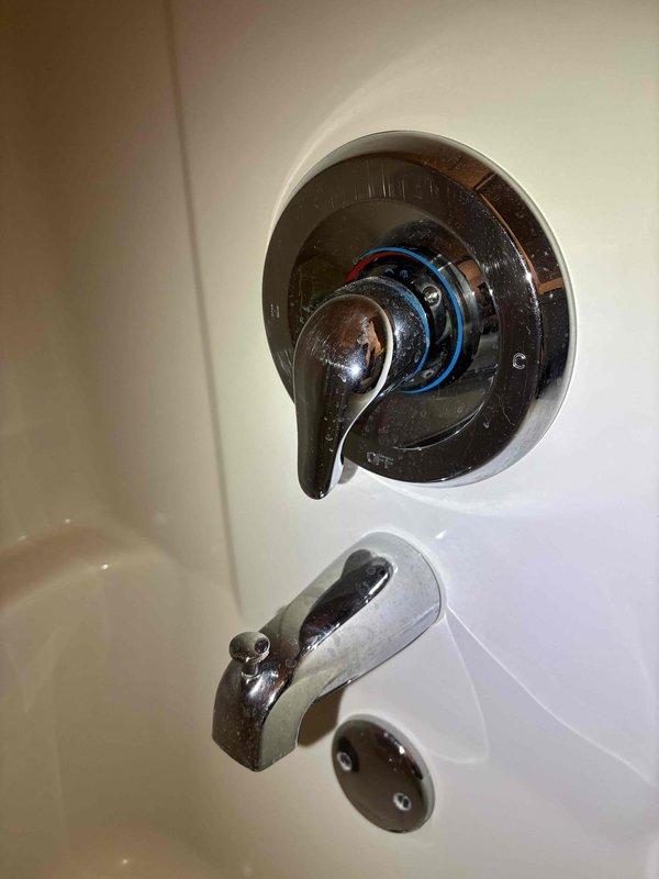 Removed and replaced customer's shower head that was stuck and required professional assistance. Inspected under-sink plumbing including P-trap, drain pipes, and disposal unit to ensure proper function. All fixtures were tested and confirmed to be operating correctly with no leaks detected.