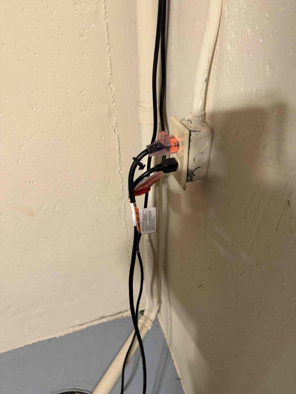 Replaced faulty sump pump in basement due to non-functioning float. Installed new submersible pump with proper connection to existing PVC discharge pipe and verified electrical connections were secure and operational.