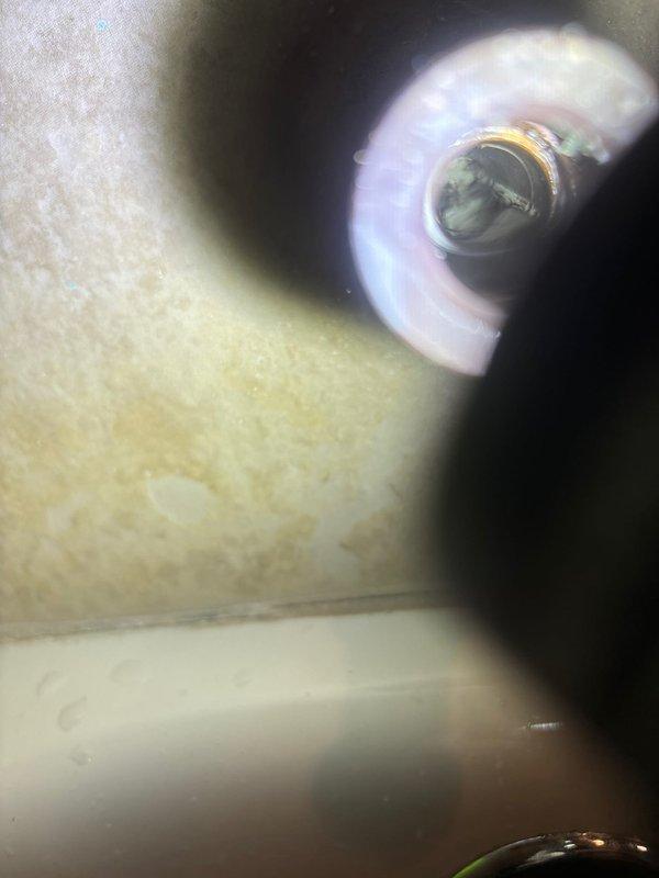 Responded to service call for low water pressure in upper level bathroom faucet. Upon inspection, identified mineral buildup in the aerator and partial blockage in the supply line. Disassembled faucet, cleaned aerator and supply lines, and verified restored proper water flow and pressure after reassembly.