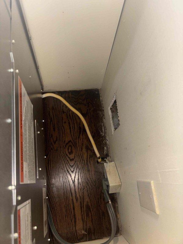 Installed new flexible gas line through ceiling and wall cavity to service kitchen appliance. Connected line to existing gas supply and secured properly to structural elements. Verified connections for proper seal and performed leak test to ensure safe operation.