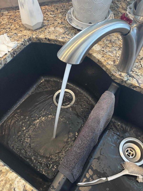 Performed diagnostic assessment of water pressure issues in multiple faucets throughout the property. Inspected sump pump system in basement drainage pit, confirming proper operation despite accumulated sediment. Tested kitchen sink faucet flow rate, identifying mineral buildup in aerator as source of restricted water pressure in affected fixtures.