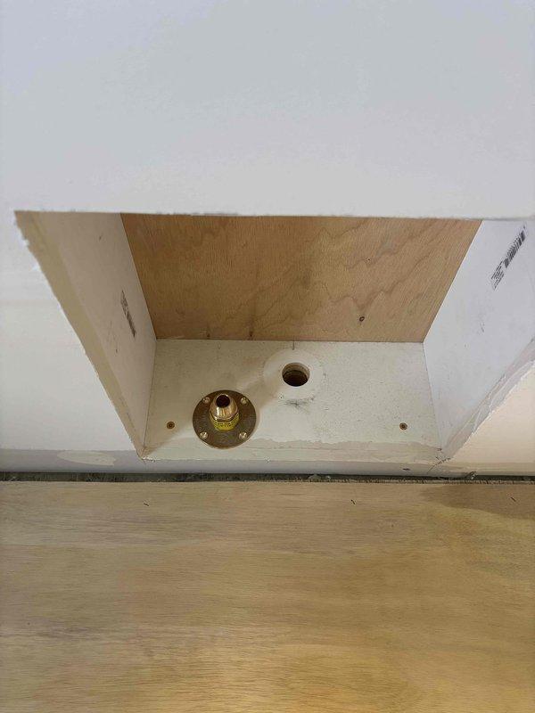 Installed gas line connection from basement to kitchen, requiring wall and ceiling access points. Created access panels to properly route and secure the brass gas fitting, ensuring code-compliant installation. Completed all necessary connections and verified system integrity before finalizing the installation.