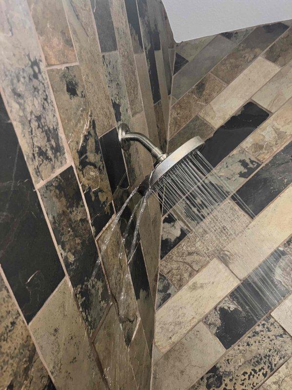 Successfully replaced and installed a Price Pfister shower cartridge to restore proper shower function. Tested water flow after installation, confirming correct operation with no leaks present.