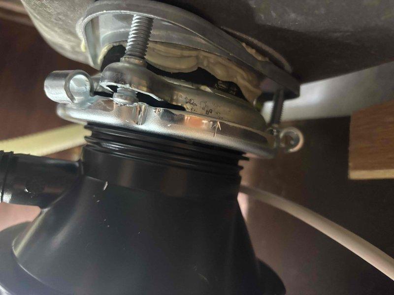 Replaced leaking garbage disposal unit in kitchen. Installed new disposal with proper mounting hardware and verified watertight connections at sink flange and drain pipes. Tested operation to confirm no leaks and proper function.