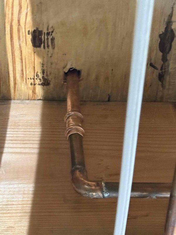 Successfully accessed wall to remove and replace ice maker box, including installation of copper supply line with proper brass fittings and connection of braided supply line to the new unit. All connections were properly soldered and tested to ensure proper functionality, though customer was informed that drywall repair was not included in the service.