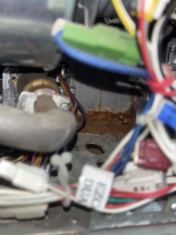 Performed scheduled maintenance service on plumbing system and identified significant corrosion at copper pipe junction with evidence of moisture damage. Inspected electrical connections in vicinity of affected area, noting rust formation and potential water intrusion that could compromise system integrity. Successfully remediated the issue to restore proper functionality.