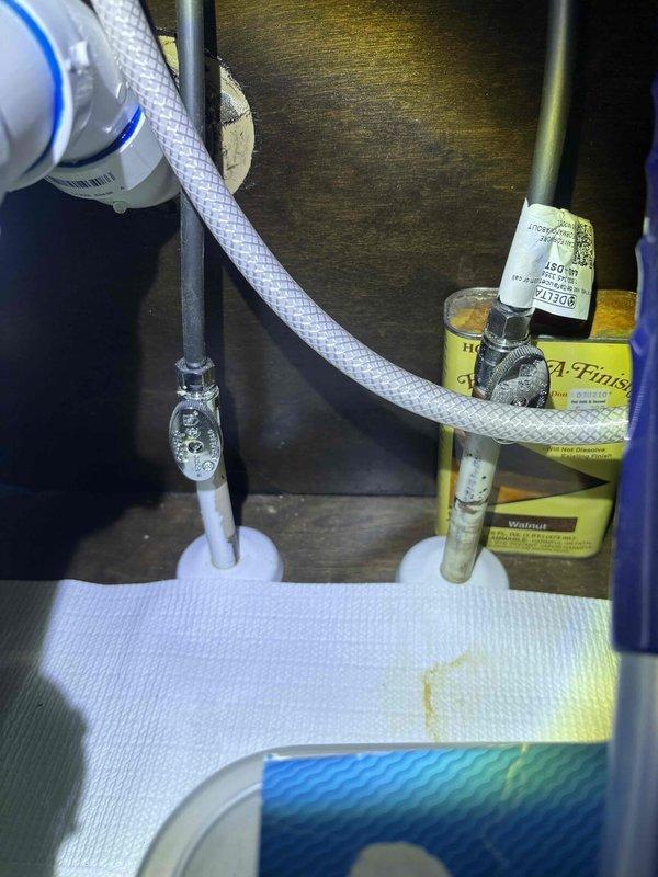 Conducted a comprehensive whole-home plumbing inspection at customer's request following promotional offer. Inspected bathroom fixtures including modern faucet and under-sink plumbing connections, verifying proper installation of supply lines and drainage components. No plumbing issues were identified; all systems functioning normally.