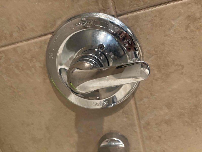 Performed service repair on Delta Monitor shower system, including replacement of corroded shower cartridge. Successfully installed new Delta single-handle trim kit, restoring proper functionality to the shower fixture. All components tested and confirmed working properly upon completion.