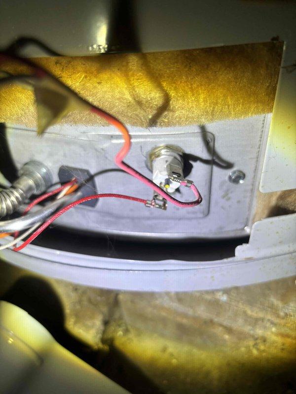 Responded to no hot water call for tanked water heater with pilot light issue. Accessed unit in basement, inspected gas valve and thermocouple assembly. Cleaned thermocouple connection points, relit pilot light, and verified proper operation of water heater with consistent flame pattern. System now producing hot water as expected.