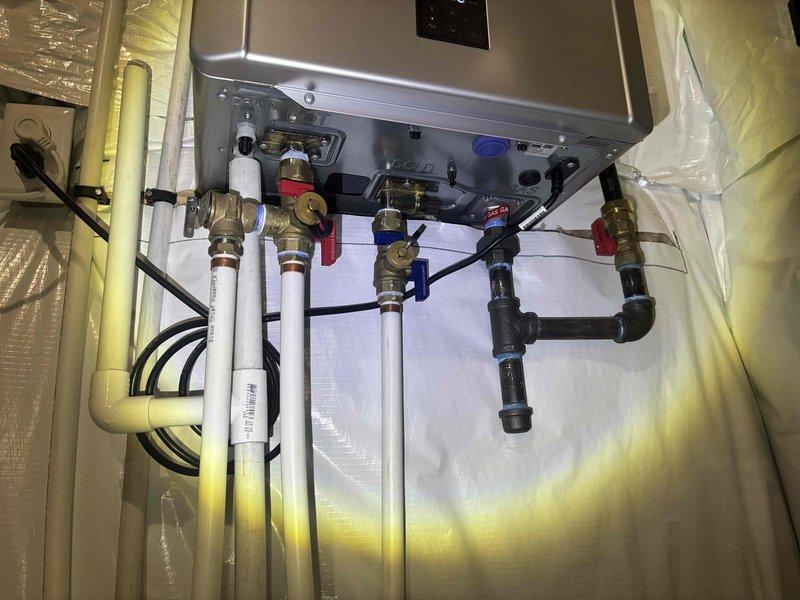 Performed scheduled tankless water heater flush maintenance service to remove mineral deposits and ensure optimal system performance. Inspected the installation, which includes proper valve configuration with isolation valves for service access and appropriate venting. Reviewed upcoming plumbing modification plans with customer, explaining the proposed changes and implementation timeline.