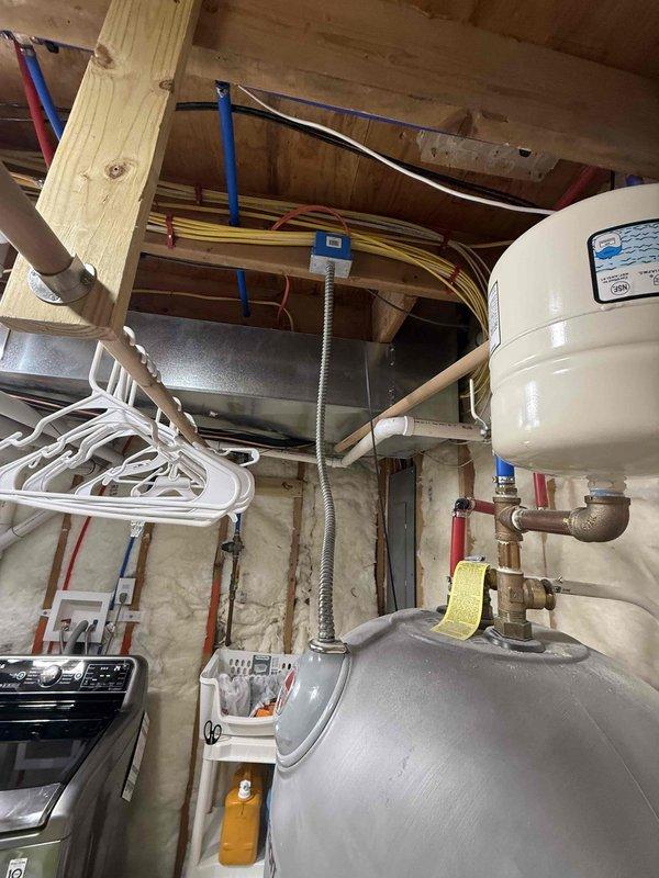 Completed on-site assessment and provided quote for upgrading from existing 50-gallon electric water heater to 80-gallon electric model. Current installation shows Marathon brand electric water heater in unfinished basement with PEX plumbing connections and proper electrical supply. Upgrade would require modifications to existing piping configuration while maintaining compliance with local code requirements.