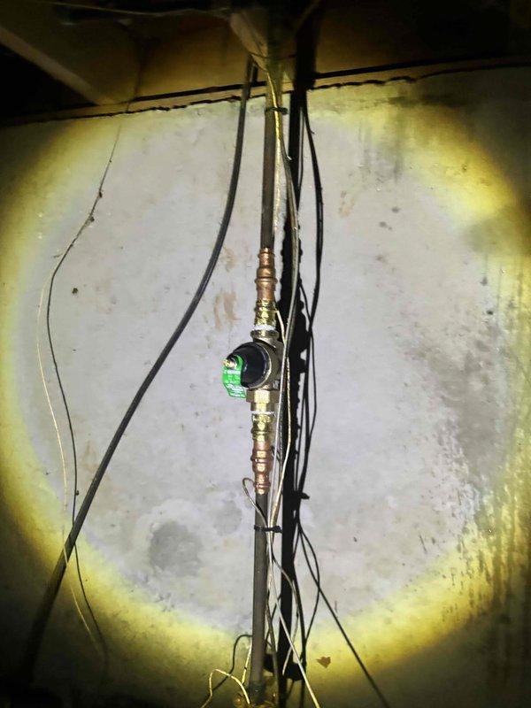 Responded to service recall for water heater producing concerning whistling noise. Upon inspection, found excessive pressure in the system causing whistling through the TPR valve. Adjusted pressure regulator valve and verified proper operation of temperature and pressure relief valve. System now functioning normally with no unusual noise.