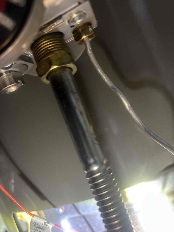 Diagnosed and serviced a tanked water heater that was not heating properly. Inspected gas line connections and flexible metal conduit, finding a loose connection at the brass fitting. Tightened connection and verified proper heating function, restoring hot water service to the property.