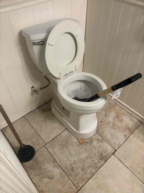 Performed main drain cleanout service on a 55-year-old residential property. Located and accessed the main drain cleanout in the basement, utilizing professional drain cleaning equipment to clear the line and restore proper drainage. Upon inspection of the bathroom facilities, identified a deteriorating wax seal on the toilet that will require future attention to prevent water damage and ensure proper fixture sealing.