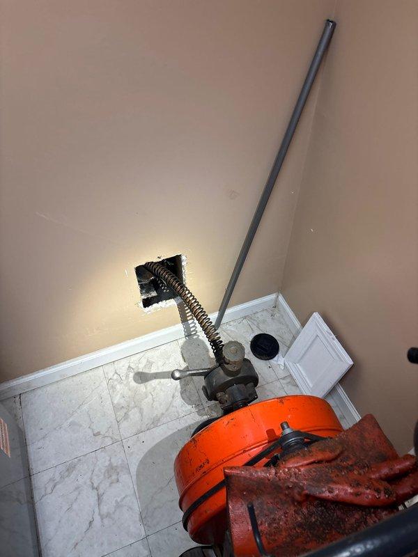 Responded to a main drain backup in the basement. Deployed professional drain cleaning equipment with power auger to clear the obstruction in the main sewer line. Successfully accessed the cleanout, fed cable through the line, and removed the blockage restoring proper drainage. System tested and confirmed operational upon completion.