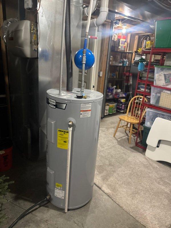 Completed preventative plumbing maintenance inspection on residential water heater and associated plumbing systems. Inspected water heater unit, thermal expansion tank, pressure relief valve, supply lines, and shut-off valves for proper operation and signs of wear or leakage. All components found to be in good working condition with no immediate repairs required.