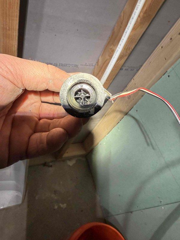 Performed tankless water heater repair by replacing a faulty flow sensor (part number 30010537A) and check valve (part number 30002282E). Both components were successfully installed to restore proper water flow detection and prevent backflow in the system, returning the unit to full operational status.