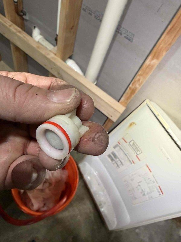 Performed tankless water heater repair by replacing a faulty flow sensor (part number 30010537A) and check valve (part number 30002282E). Both components were successfully installed to restore proper water flow detection and prevent backflow in the system, returning the unit to full operational status.