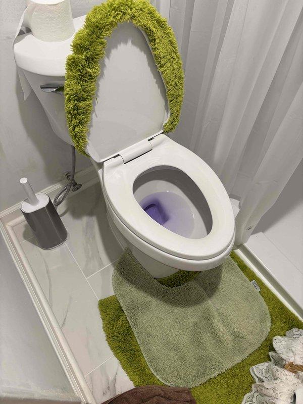 Responded to reported clogged drain with backup from upstairs kitchen sink to main bathroom sink downstairs. Upon inspection, confirmed water accumulation with residue in bathroom sink basin. Assessed drainage system and cleared blockage causing cross-contamination between fixtures. Verified proper drainage flow restored to both kitchen and bathroom sinks, eliminating backup issue.