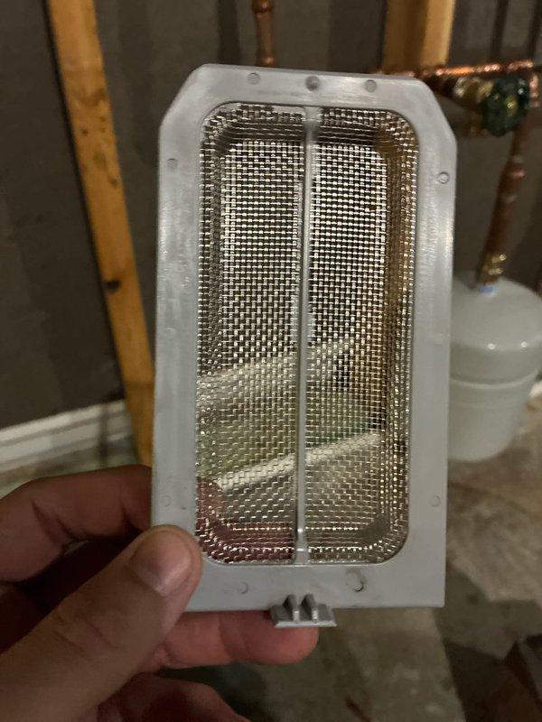 Performed routine plumbing maintenance on a Rinnai tankless water heater system, including inspection of all water supply lines, copper piping connections, and PEX/PVC plumbing components. Cleaned and inspected the system's inlet filter screen, which showed no debris accumulation, and verified proper operation of the expansion tank and associated pressure relief valves.