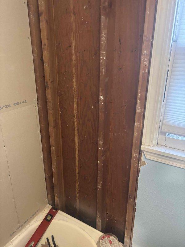 Installed customer-supplied shower valve in bathroom undergoing renovation. Completed rough-in plumbing connections, secured valve to exposed framing, and verified proper operation of mixing mechanism and temperature control. Protected existing bathtub fixture with moving blanket during installation work.